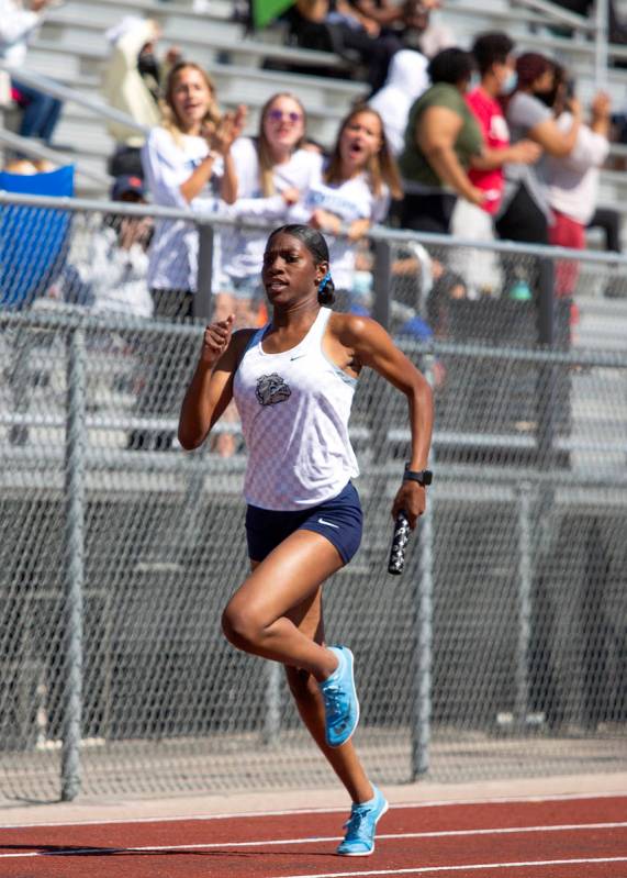 Centennial's Iyonna Codd competes in the girls 4x200 meter relay race during the class 5A South ...