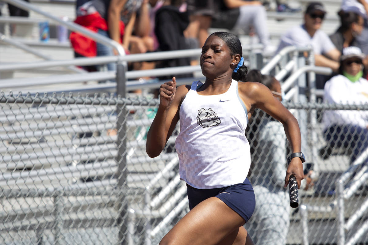 Centennial's Iyonna Codd competes in the girls 4x200 meter relay race during the class 5A South ...