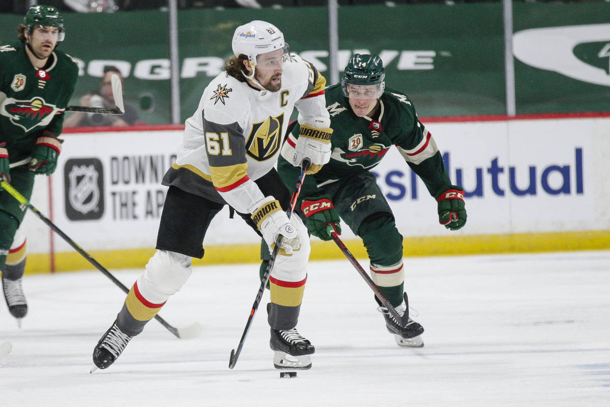 Vegas Golden Knights right wing Mark Stone (61) passes against Minnesota Wild center Joel Eriks ...