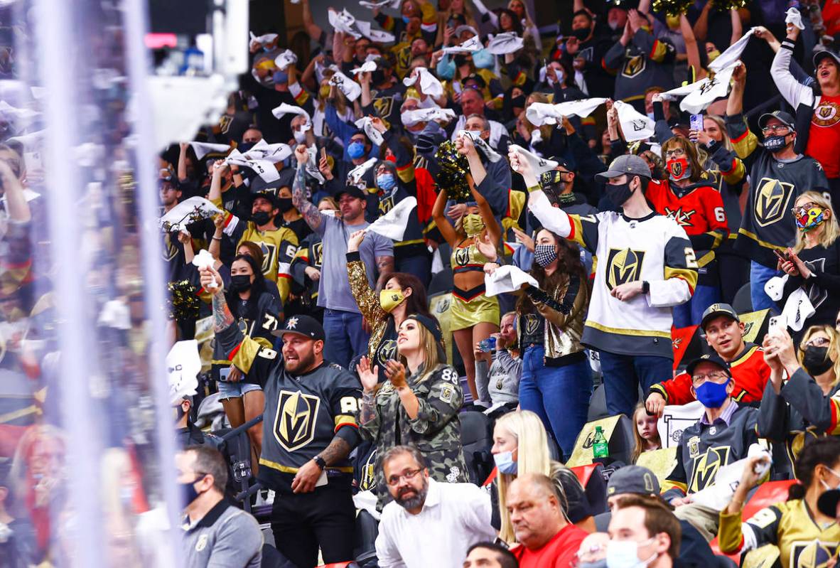 Golden Knights fans cheer at the start of Game 5 of a first-round NHL hockey playoff series aga ...