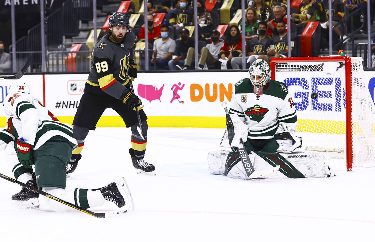 Golden Knights' Alec Martinez, not pictured, scores a goal past Minnesota Wild goaltender Cam T ...