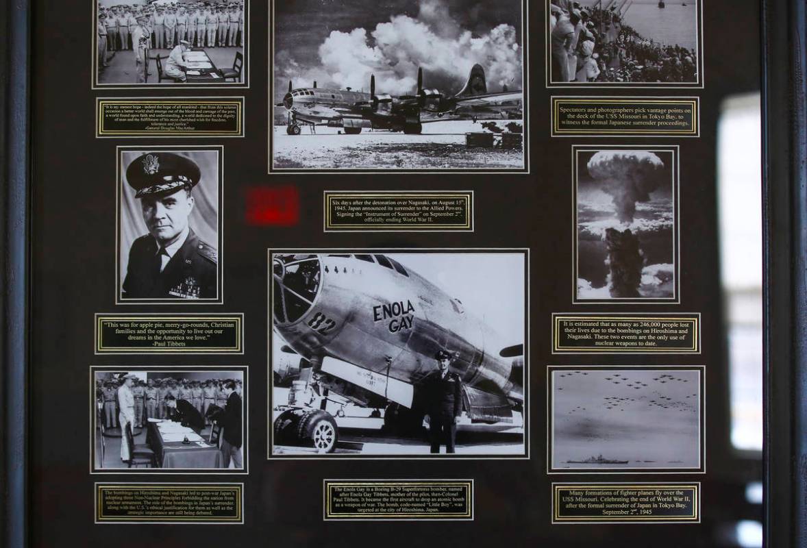 Historical photographs of then-Col. Paul Tibbets and the Enola Gay during a tour of the Histori ...