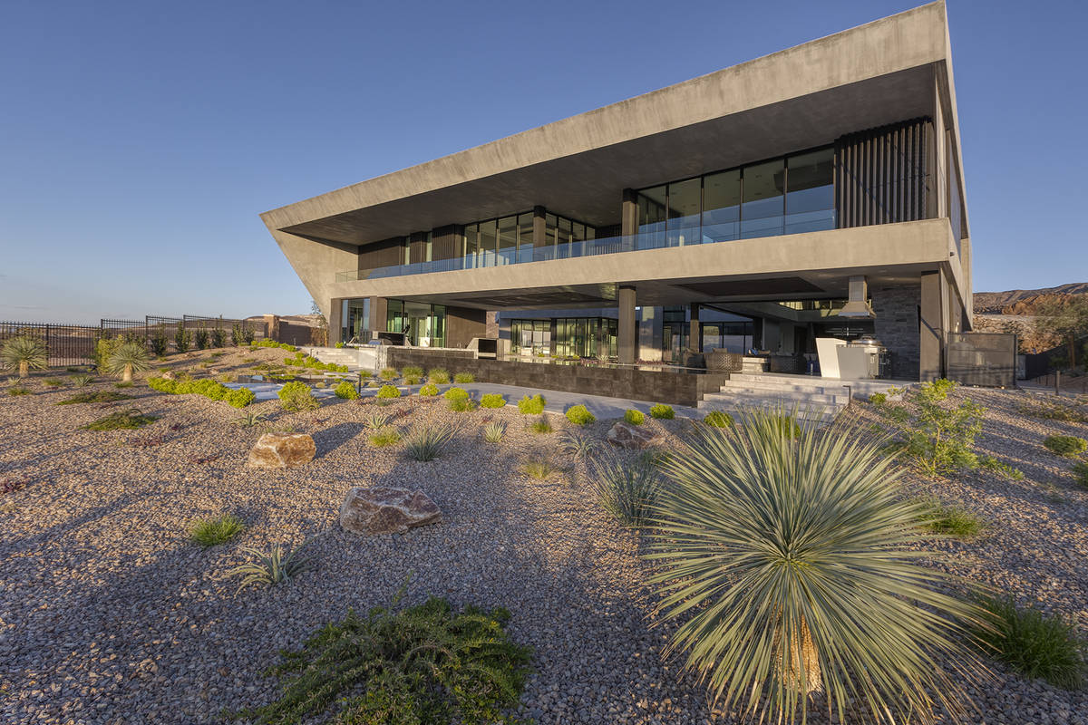 The home has desert landscaping. (Synergy Sotheby’s International Realty)