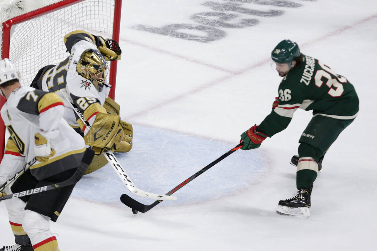 Vegas Golden Knights goaltender Marc-Andre Fleury (29) stops a shot by Minnesota Wild right win ...