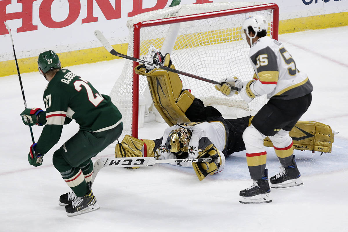 Minnesota Wild center Nick Bjugstad (27) scores a goal on Vegas Golden Knights goaltender Marc- ...