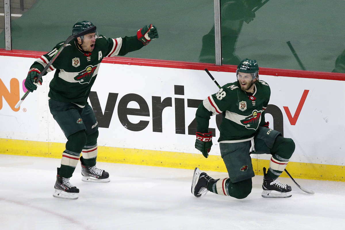 Minnesota Wild right wing Ryan Hartman (38) celebrates his goal against the Vegas Golden Knight ...