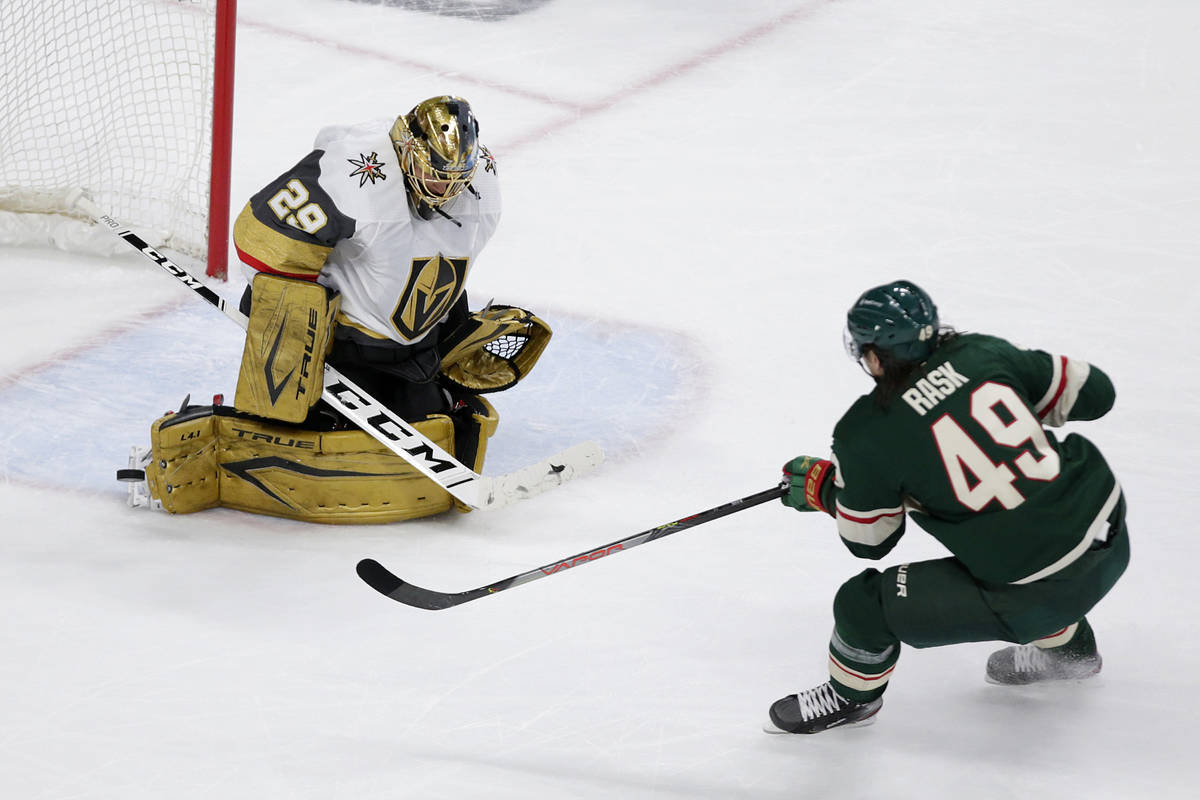 Vegas Golden Knights goaltender Marc-Andre Fleury (29) stops a shot by Minnesota Wild center Vi ...