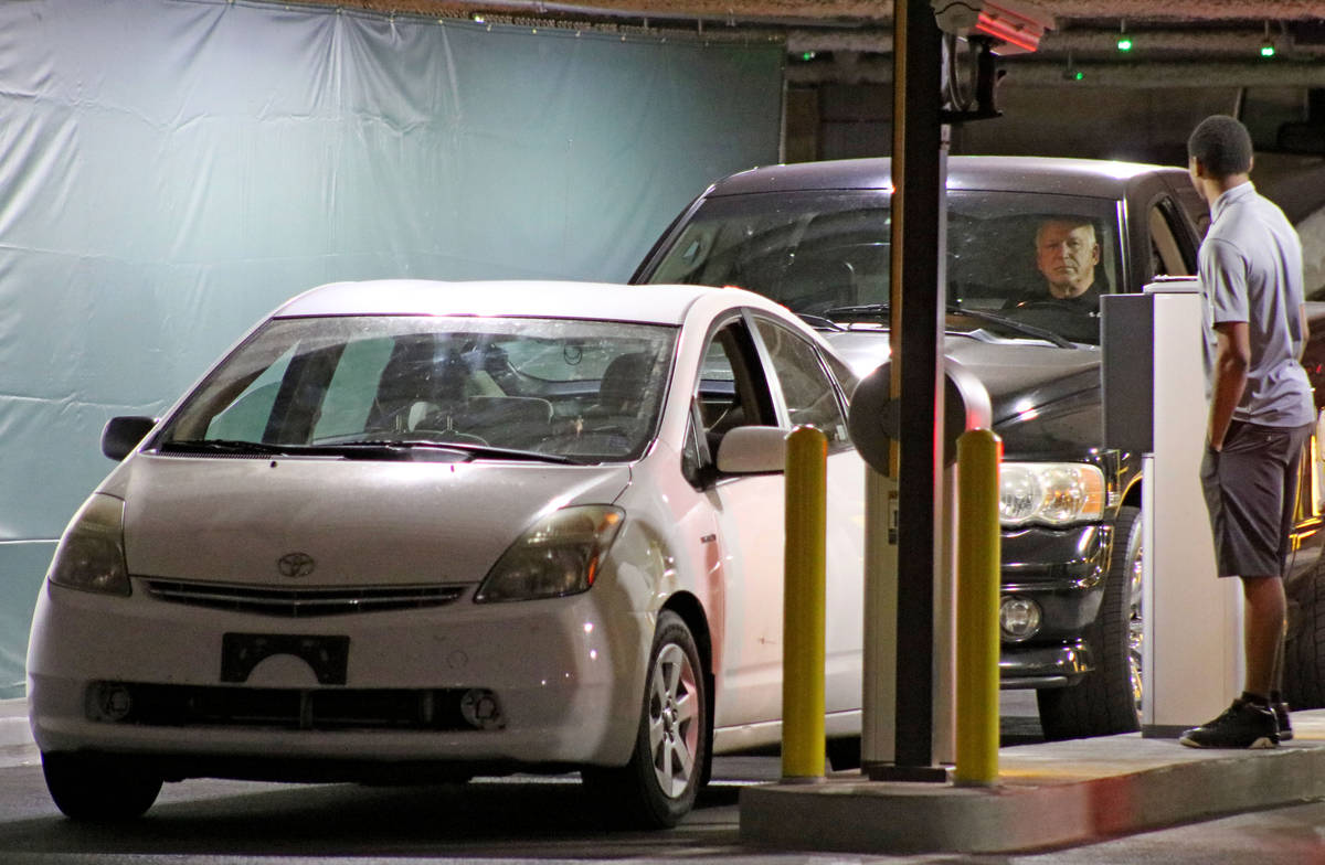 Cars receive their tickets to park at the Cosmopolitan Las Vegas parking garage in 2017. (Las V ...