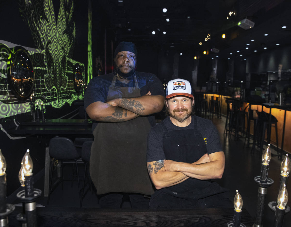 Orelle Young, left, and Joe Woodel, both BBQ pitmasters, pose for a photo at The Beast by Todd ...