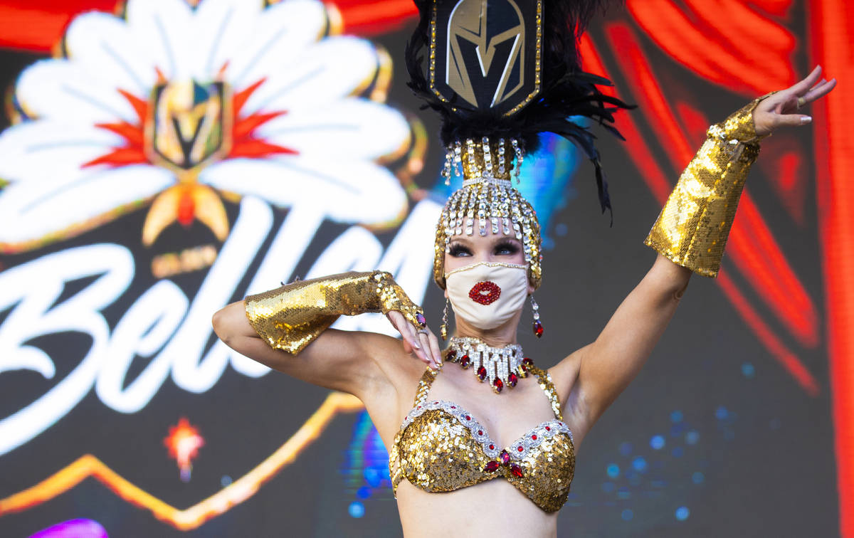 A member of the Golden Belles performs outside T-Mobile Arena before the start of Game 7 of an ...