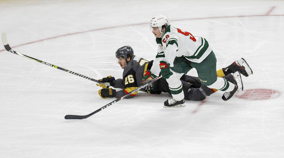 Vegas Golden Knights center Mattias Janmark (26) scores his third goal of the game with Minneso ...