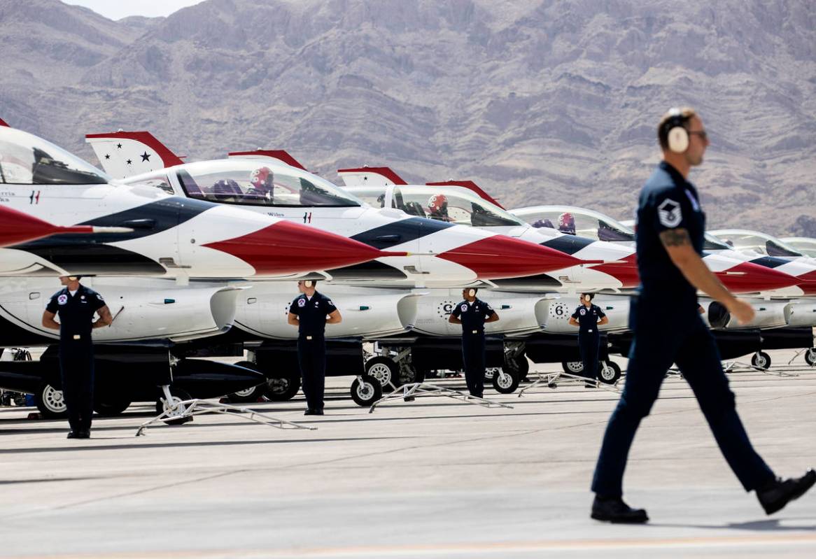 The U.S. Air Force Thunderbirds maintenance professionals stand in formation after performing p ...