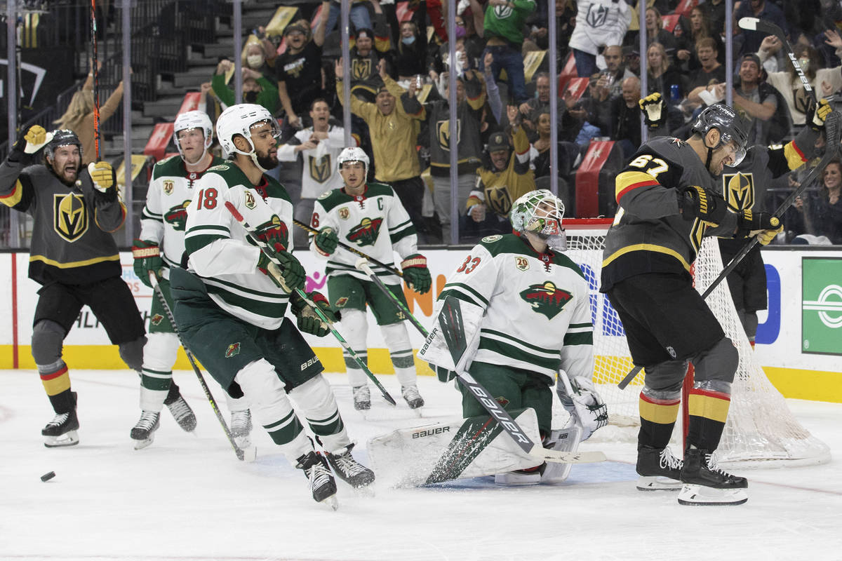 Vegas Golden Knights left wing Max Pacioretty (67) scores on Minnesota Wild goaltender Cam Talb ...