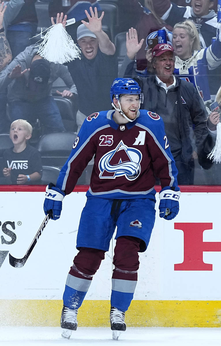 Colorado Avalanche center Nathan MacKinnon (29) celebrates a goal against the Vegas Golden Knig ...