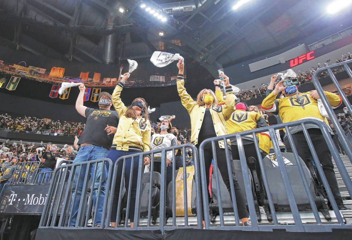 Golden Knights fans cheer before the start of Game 5 of a first-round NHL hockey playoff series ...