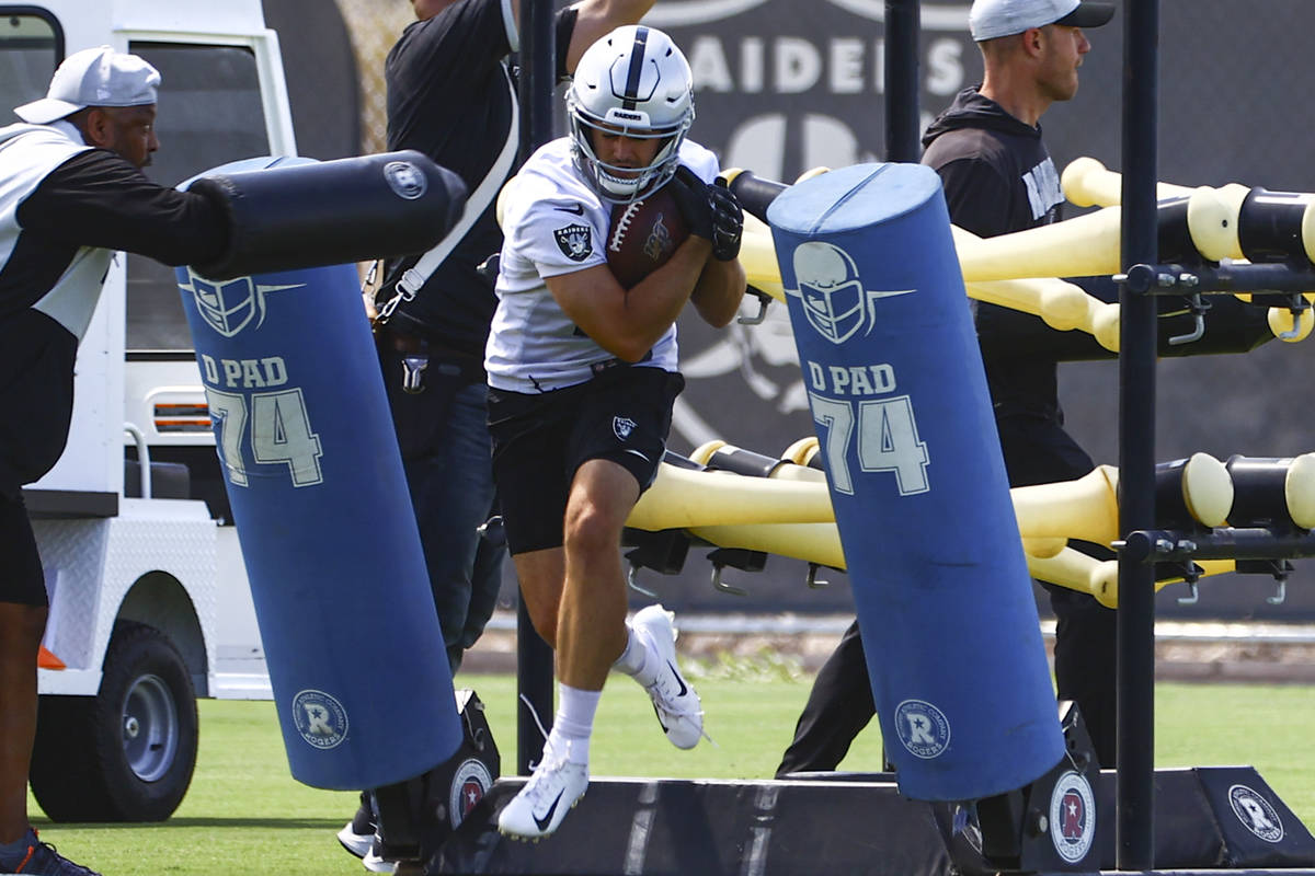 Raiders wide receiver Hunter Renfrow runs through drills during NFL football practice at Raider ...