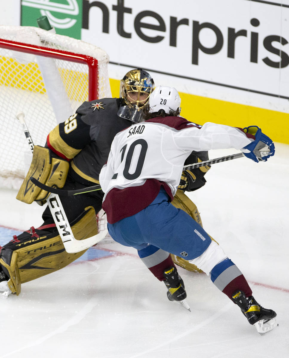 Golden Knights goaltender Marc-Andre Fleury (29) blocks Avalanche left wing Brandon Saad (20) i ...