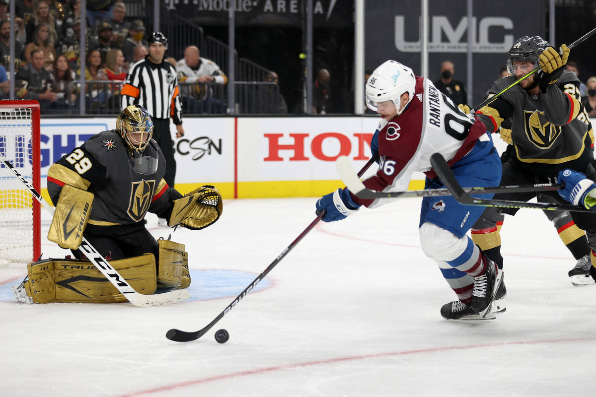 Vegas Golden Knights goaltender Marc-Andre Fleury (29) and defenseman Nick Holden (22) defend t ...