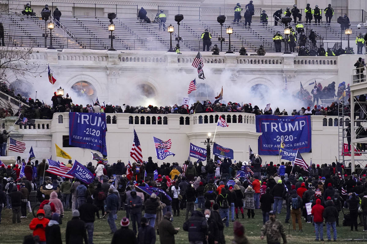 In this Wednesday, Jan. 6, 2021, file photo, violent rioters storm the Capitol, in Washington.( ...