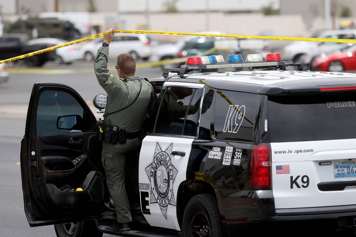 Las Vegas police work a barricade situation at the Highland Inn Motel on Dean Martin Drive nort ...