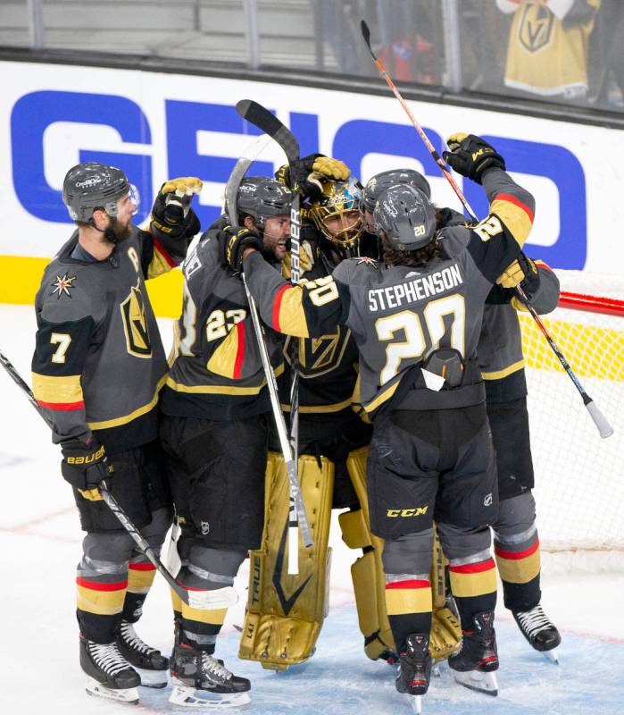 The Golden Knights celebrate a win against the Avalanche in Game 3 of a second-round NHL hockey ...