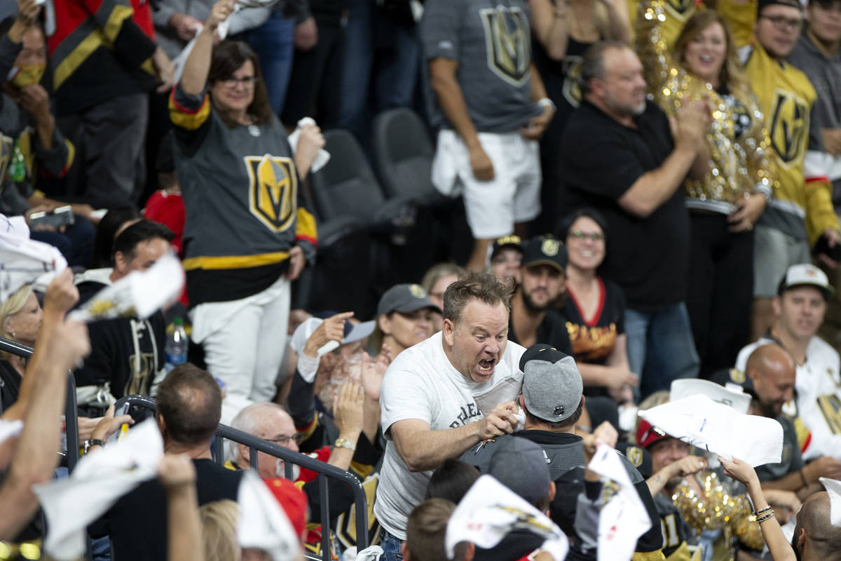 A Golden Knights fan riles up the crowd in the first period of Game 3 of a second-round NHL hoc ...