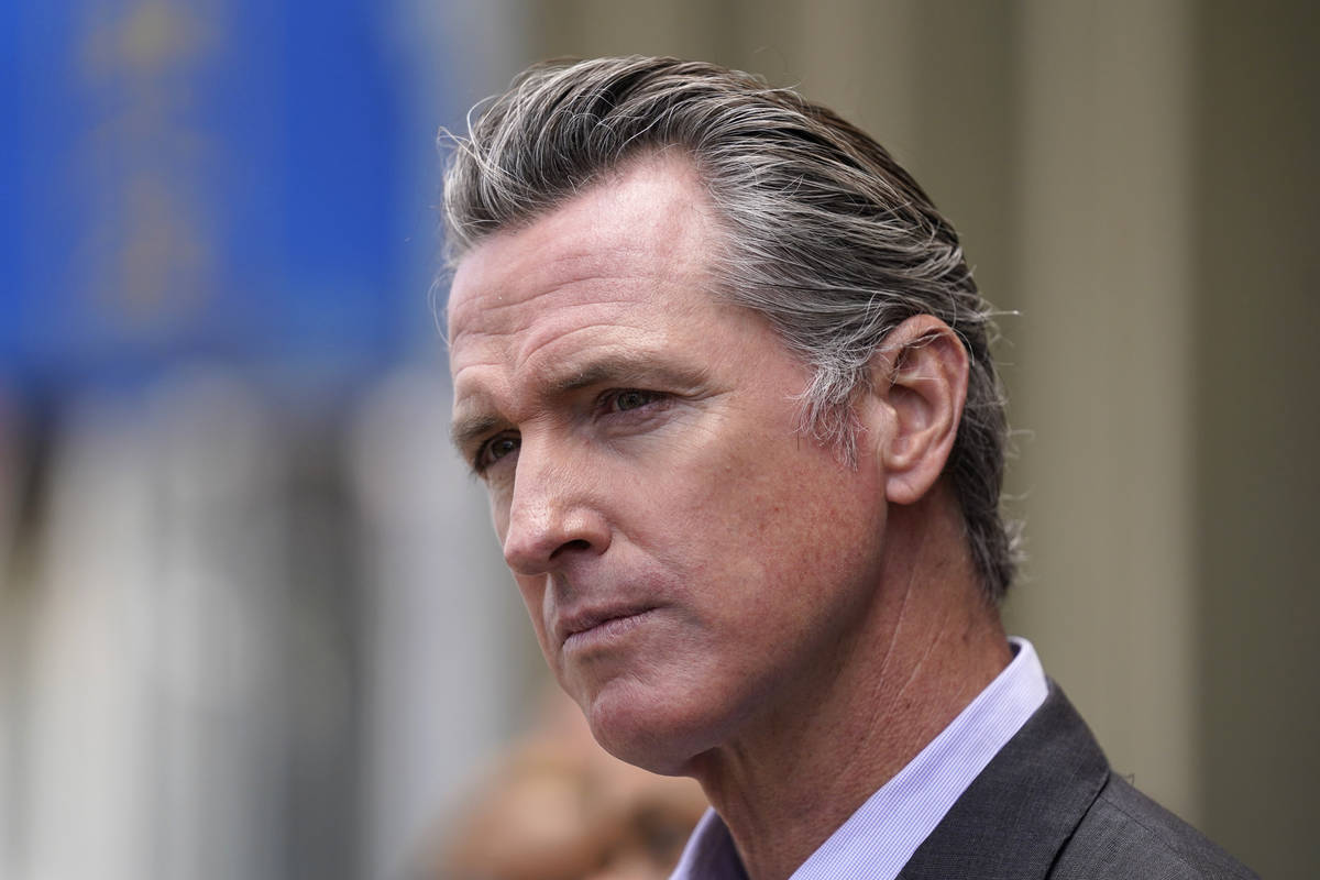 In this June 3, 2021, file photo, California Gov. Gavin Newsom listens to questions during a ne ...