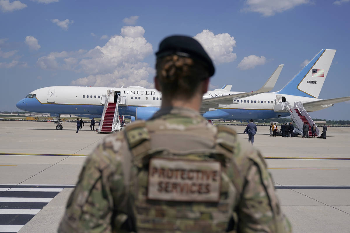 A soldier stands guard after Vice President Kamala Harris deplaned Air Force Two when a technic ...