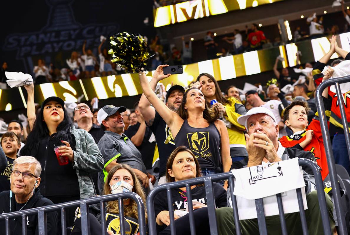 Golden Knights fans celebrate a goal by Max Pacioretty, not pictured, during the second period ...