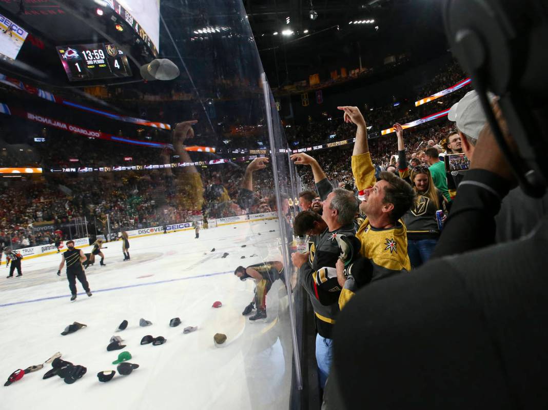 Golden Knights fans celebrate a hat trick by Jonathan Marchessault, not pictured, during the th ...