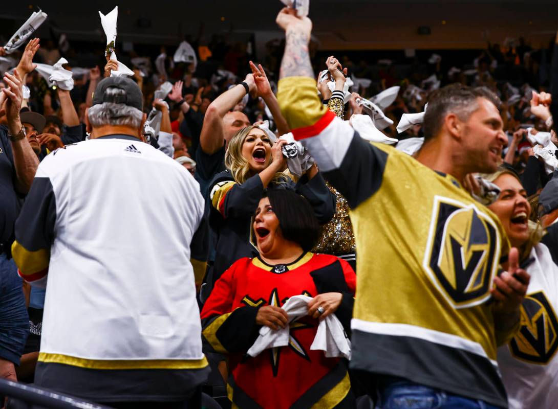 Golden Knights fans cheer after a goal by Patrick Brown, not pictured, during the third period ...