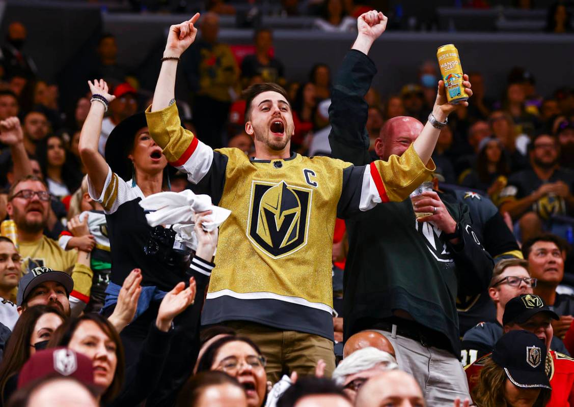 Golden Knights fans cheer after a goal by Patrick Brown, not pictured, during the third period ...