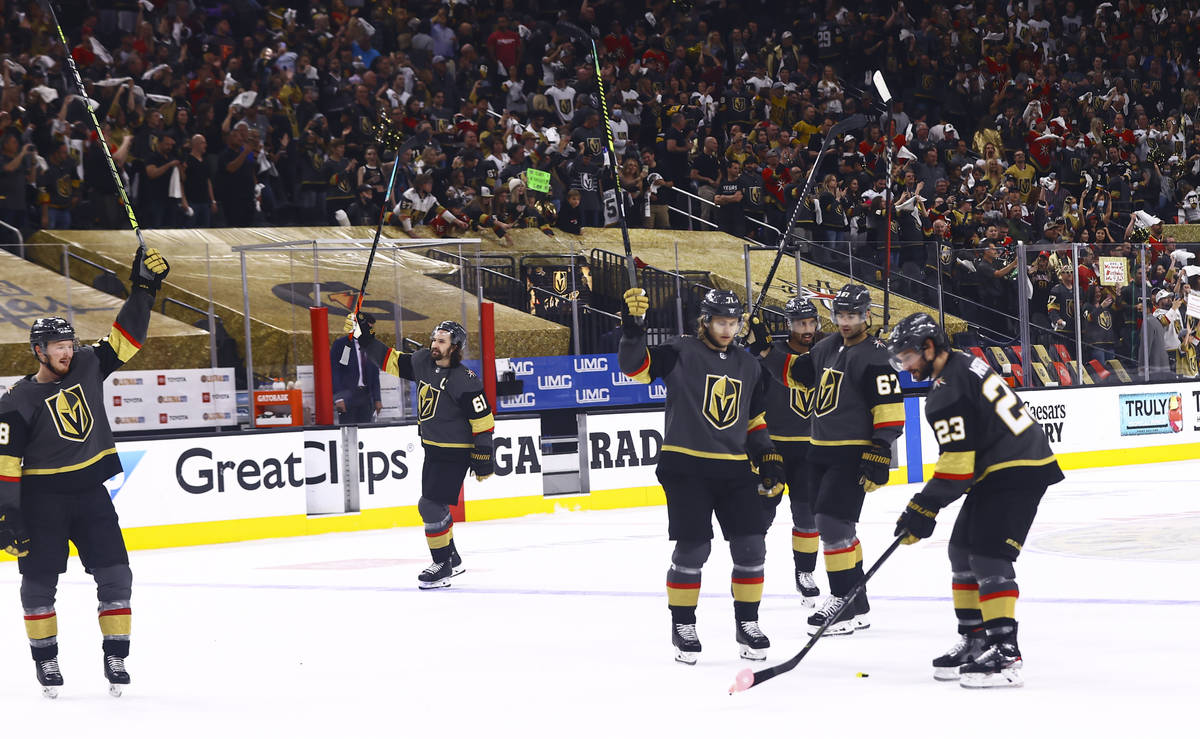 The Golden Knights celebrate after defeating Colorado Avalanche in Game 4 of an NHL hockey Stan ...