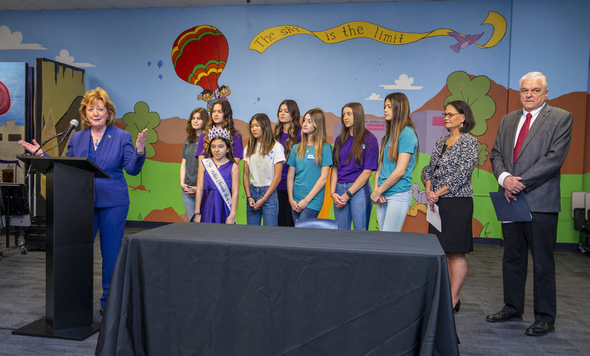 (From left) Senator Marilyn Dondero Loop, left, speaks while flanked by students, State Superin ...