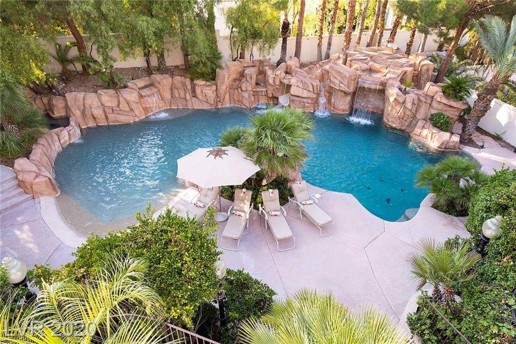 The pool area at the Tournament Hills mansion in Summerlin at 8912 Greensboro Lane. (Luxury Hom ...