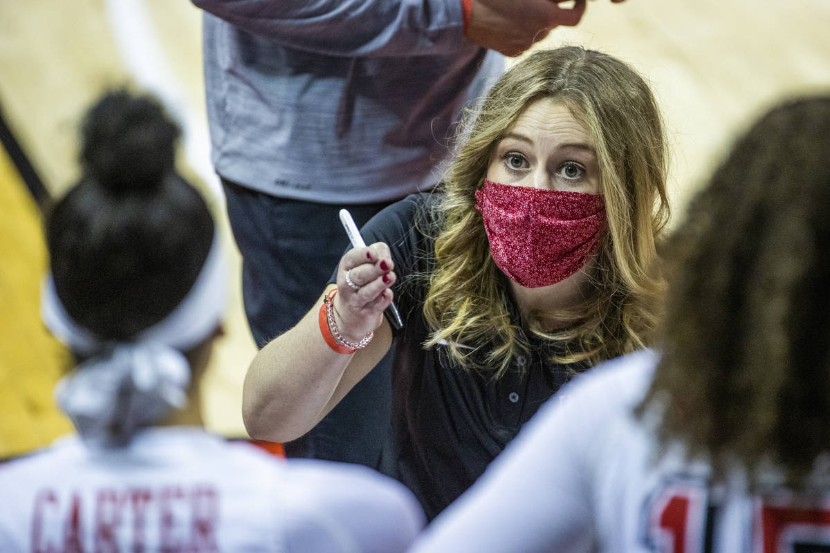 UNLV Lady Rebels head coach Lindy La Rocque instructs her players during a time out versus the ...