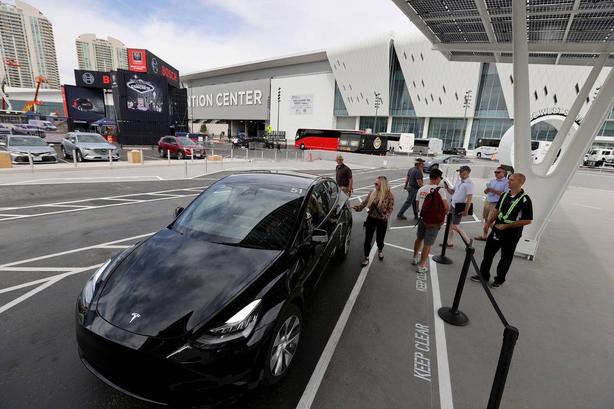 World of Concrete trade show conventioneers ride the LVCC Loop at the West Station at the Las V ...