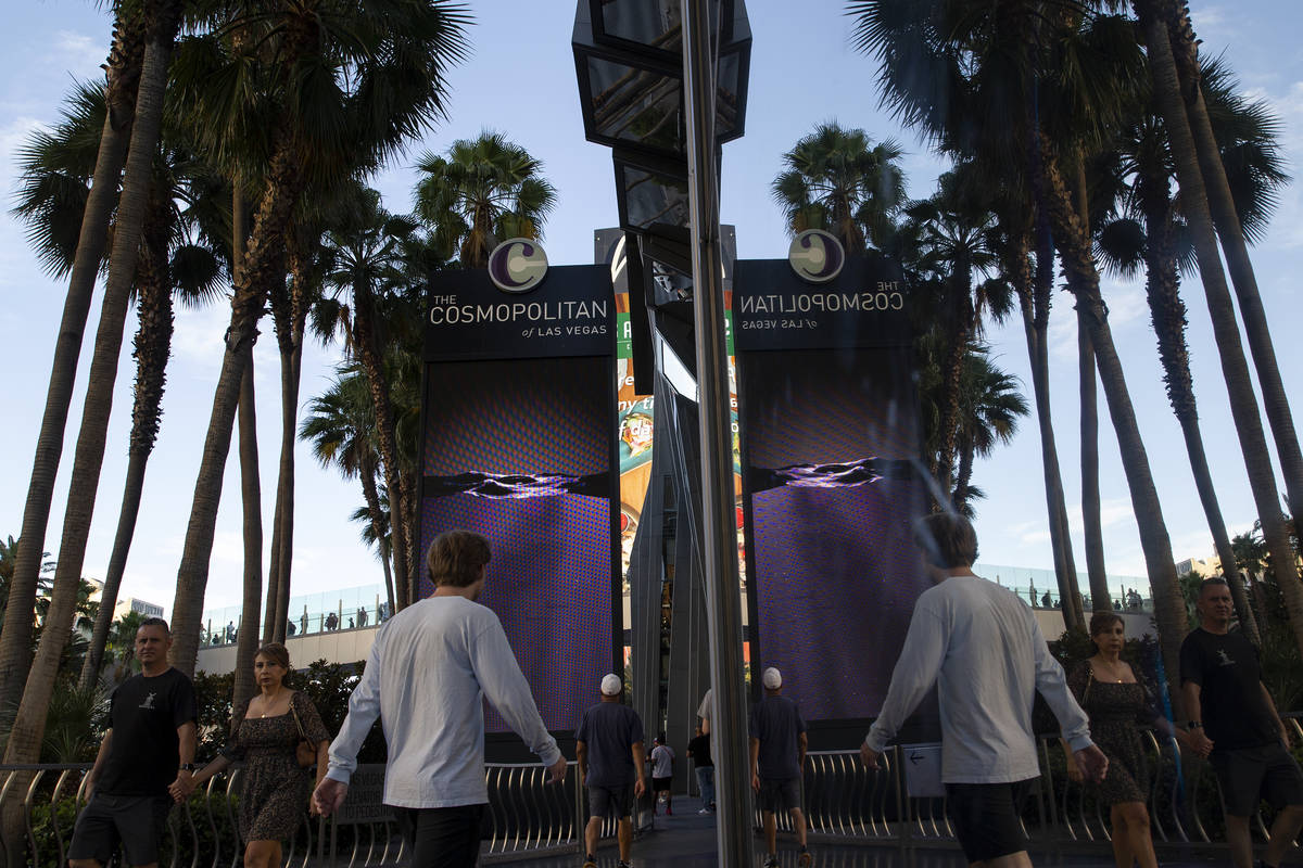 Pedestrians pass Cosmopolitan of Las Vegas on Wednesday, June 9, 2021 in Las Vegas. The Las Veg ...