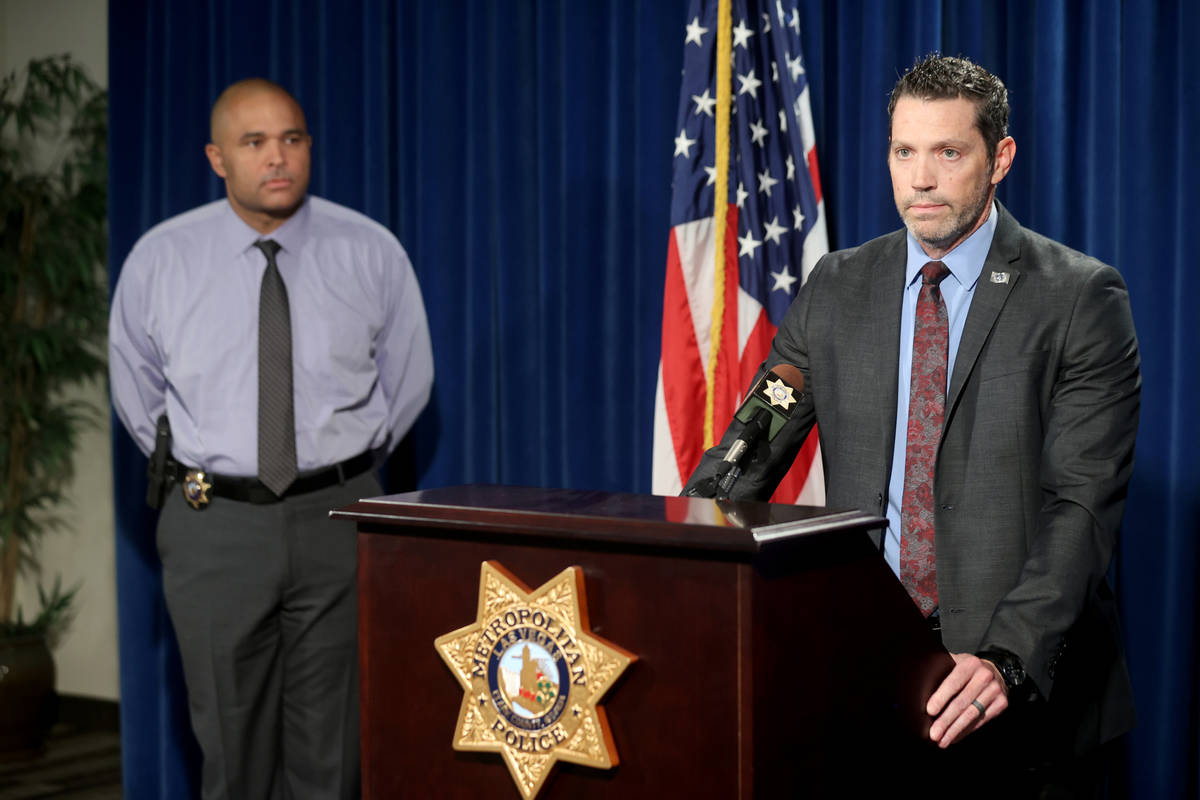 Jeremy Schwartz, FBI supervisory special agent, right and Las Vegas police Las Vegas police hom ...