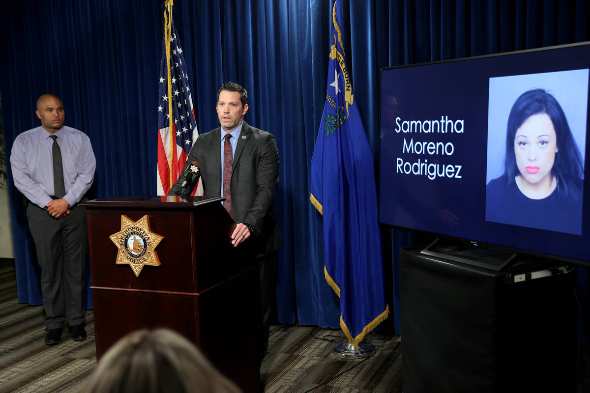Jeremy Schwartz, FBI supervisory special agent, right and Las Vegas police Las Vegas police hom ...
