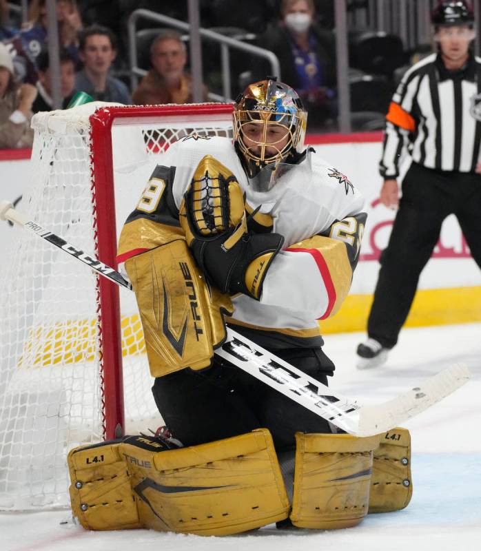 Vegas Golden Knights goaltender Marc-Andre Fleury makes a glove save on a Colorado Avalanche sh ...