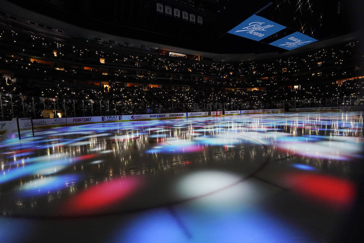 Lights illuminate the playing surface before the third period of Game 5 of an NHL hockey Stanle ...