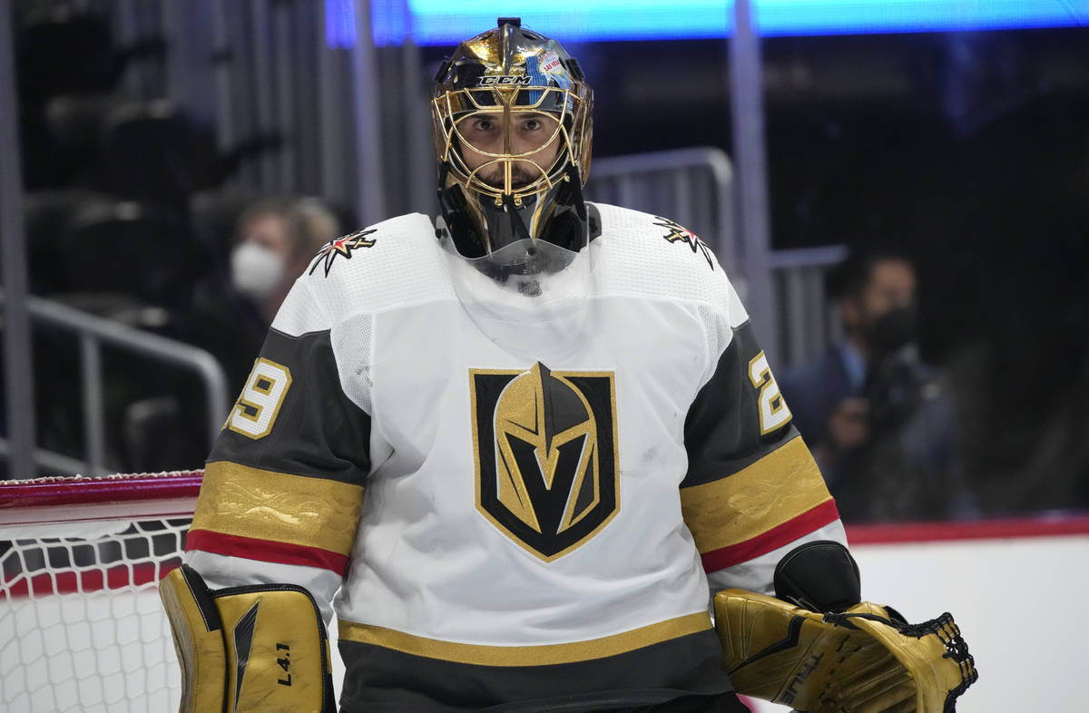 Vegas Golden Knights goaltender Marc-Andre Fleury looks into the stands during a timeout in the ...
