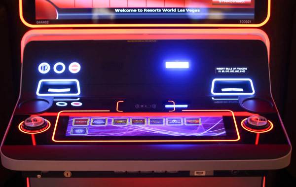 A slot machine with wireless phone charging capabilites is seen on the casino floor is seen dur ...