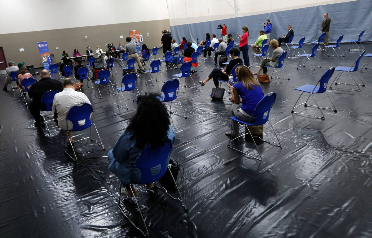People attend a Housing Resource Talk at Desert Breeze Community Center in Las Vegas, Wednesday ...