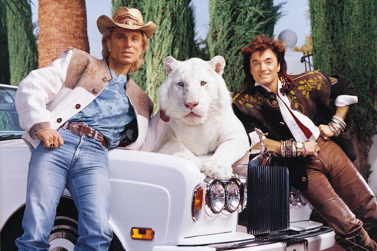 Siegfried & Roy are shown with their 1994 Rolls-Royce Corniche, up for auction at the Barrett-J ...