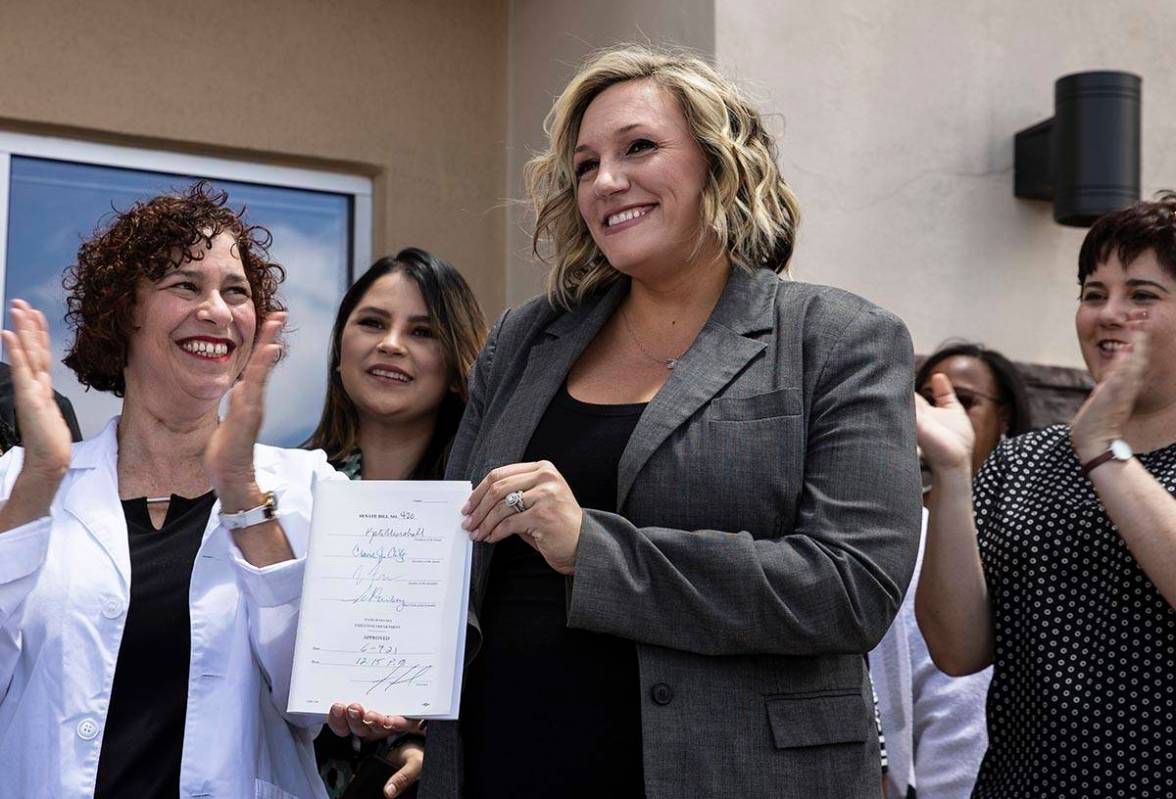 State Majority Leader Nicole Cannizzaro holds Senate Bill # 420, the bill that will provide a p ...