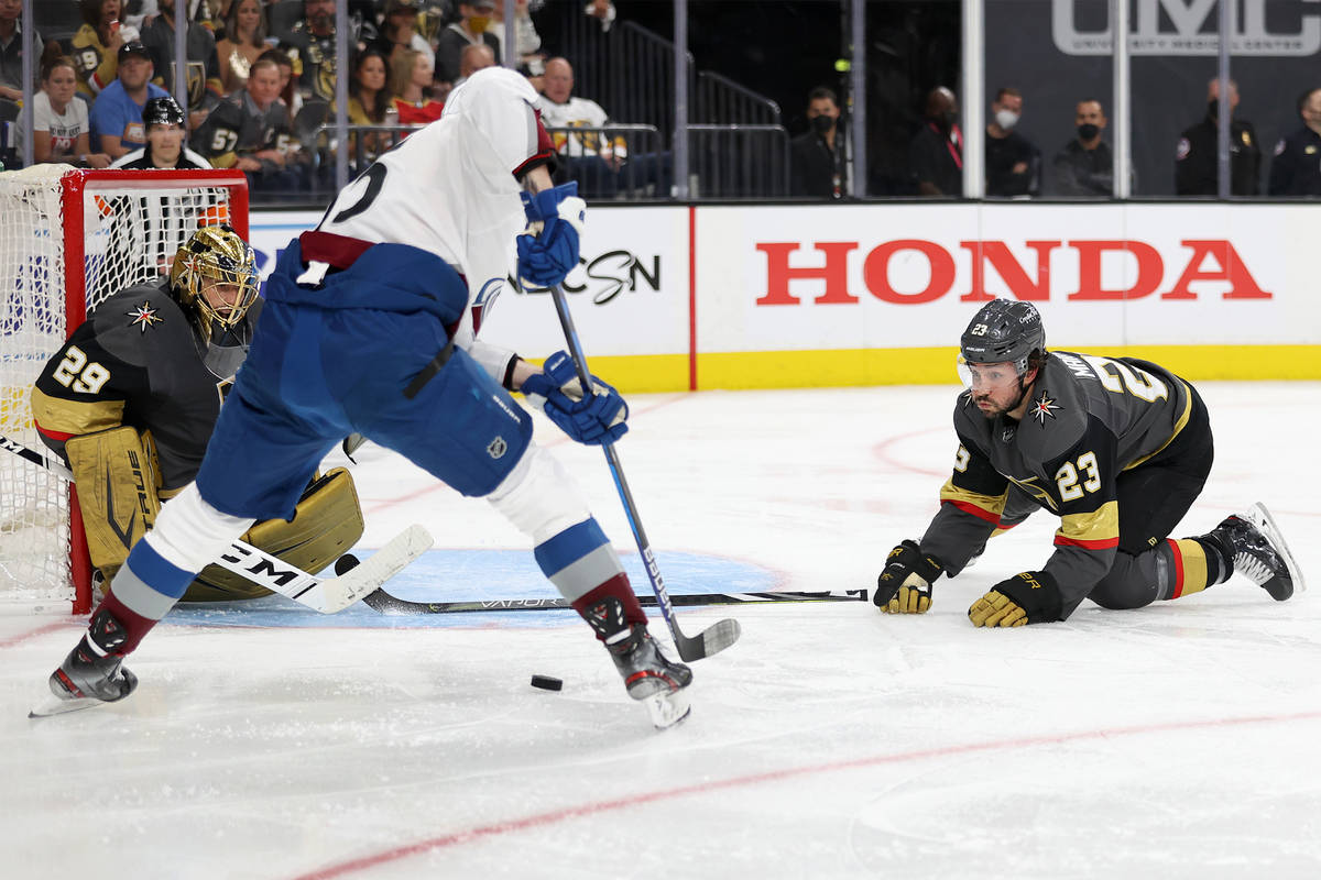 Vegas Golden Knights goaltender Marc-Andre Fleury (29) and Vegas Golden Knights defenseman Alec ...