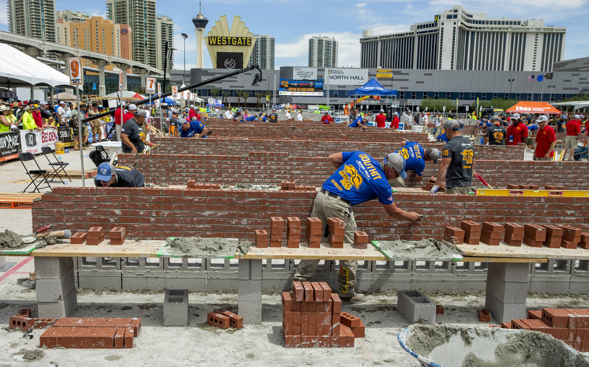 Competitor Darian Douthit of Miami, OK., cleans up his bricks and mortar and will be the eventu ...