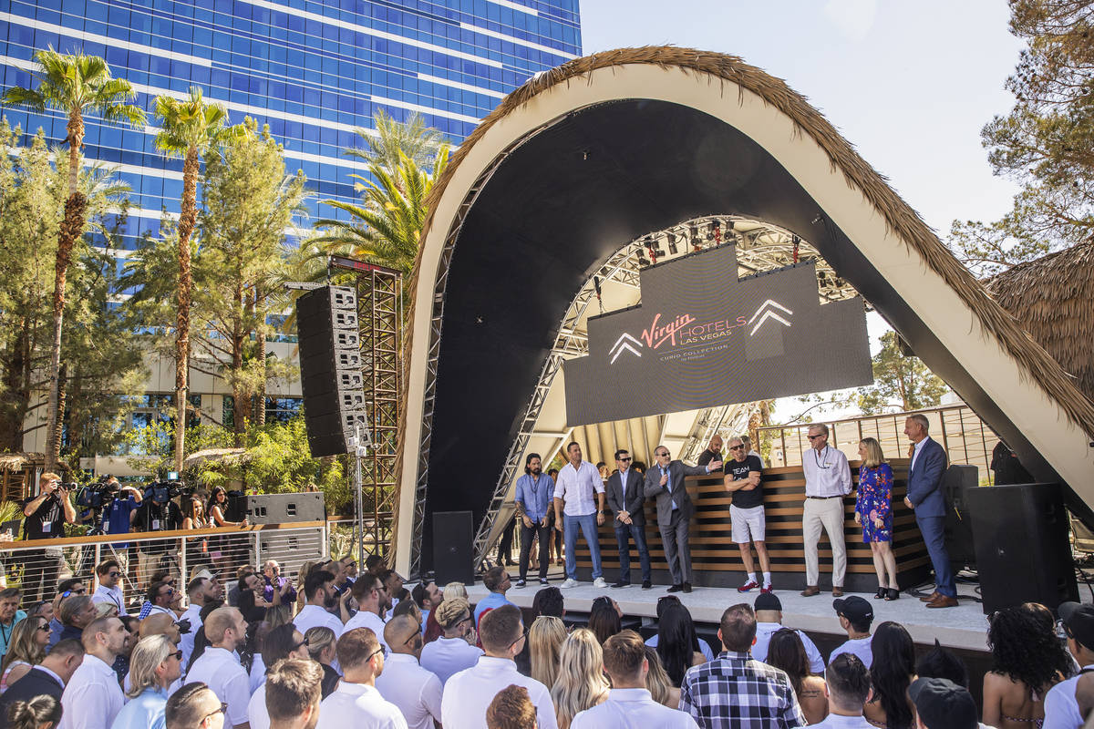 Sir Richard Branson, fourth from right, founder of Virgin Group, is introduced by Richard &#xd2 ...